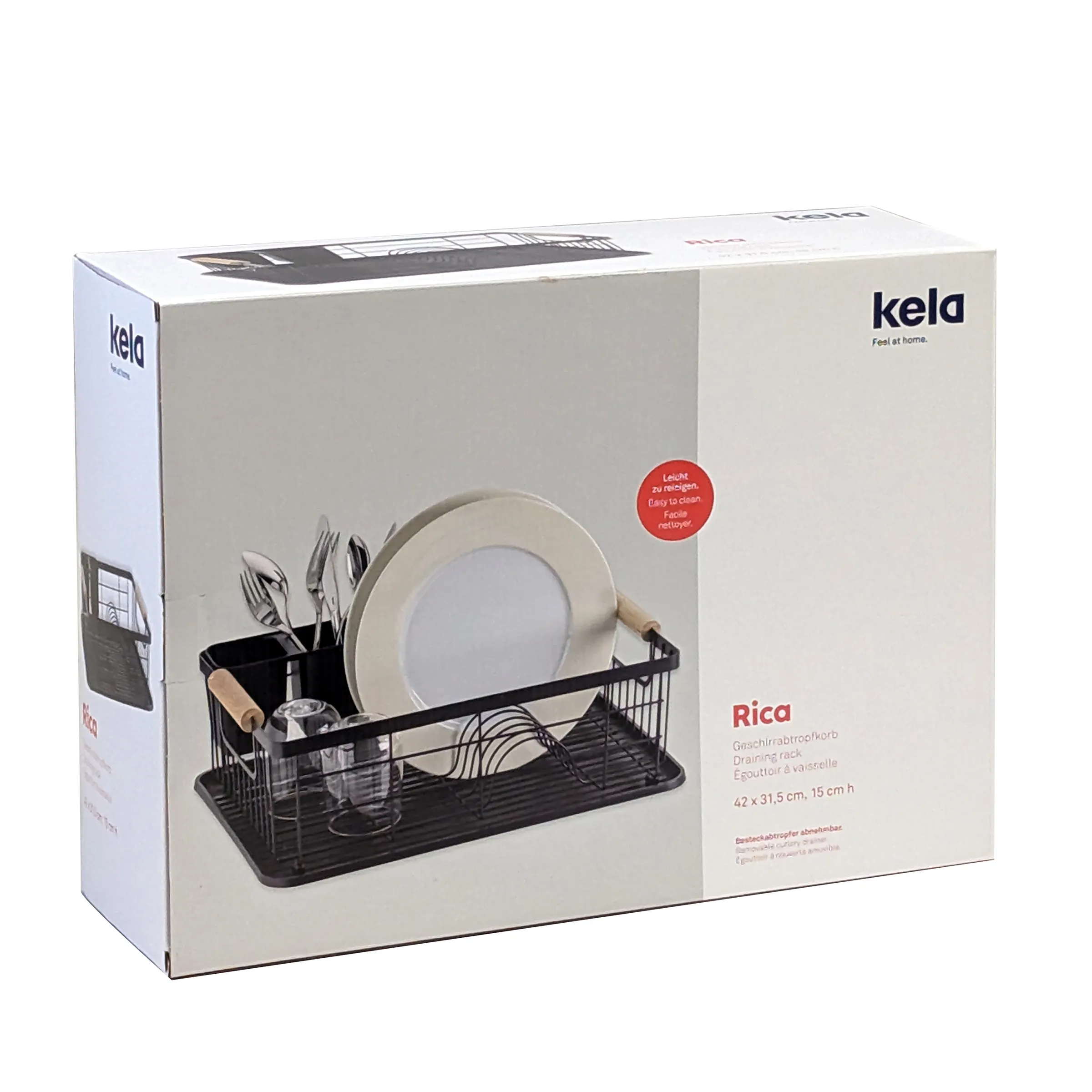 Kela Rica Geschirrständer in Schwarz mit Besteck, Tellern und Gläsern auf weißer Produktverpackung