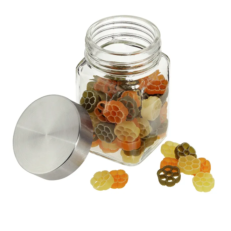 Glasdose mit Deckel und bunte Blumen-Nudeln - Küchen-Aufbewahrung Glasdose mit Metalldeckel gefüllt mit bunten Nudeln in Blumenform in orange, gelb und grün