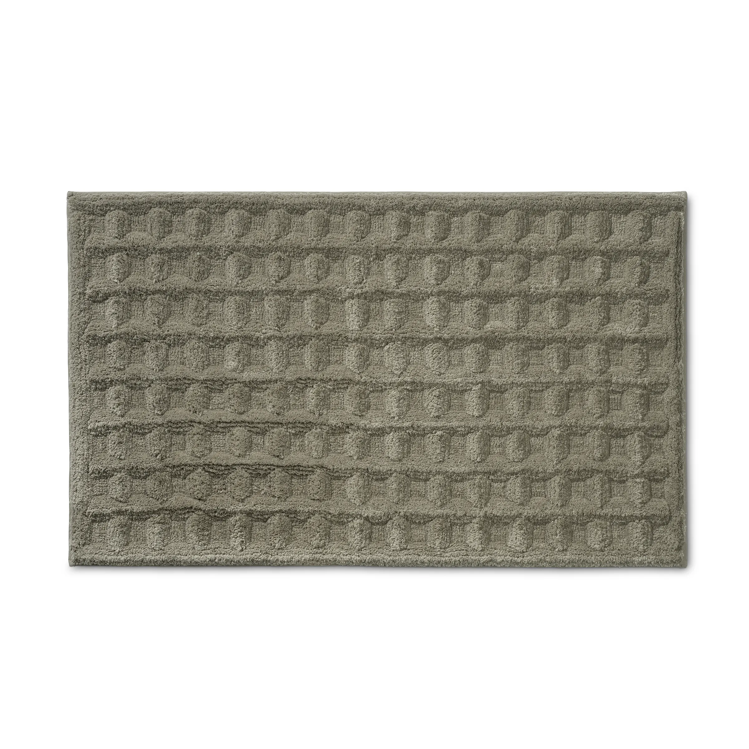 Badematte in Grün mit Strickmuster-Design Grüne Badematte mit geprägtem Strickmuster auf weißem Hintergrund