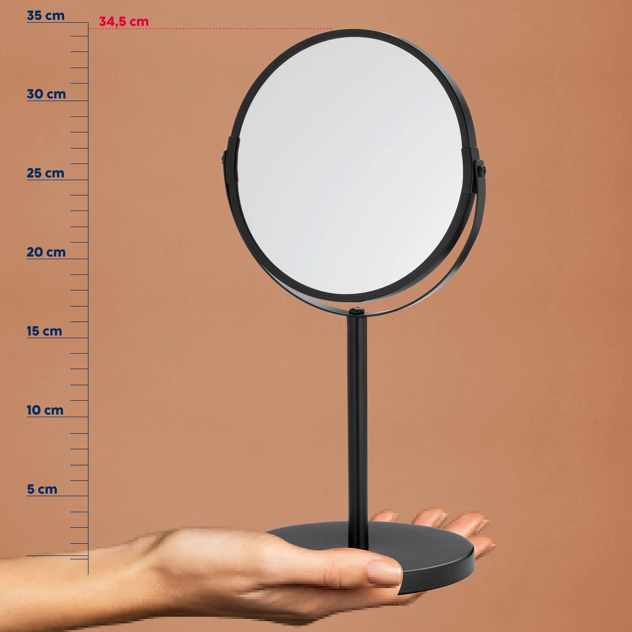 Standspiegel rund schwarz 35 cm – drehbarer Kosmetikspiegel mit Fuß Runder Standspiegel mit schwarzem Rahmen auf Hand, Maßstab 35 cm hoch, 34,5 cm Durchmesser, beiger Hintergrund