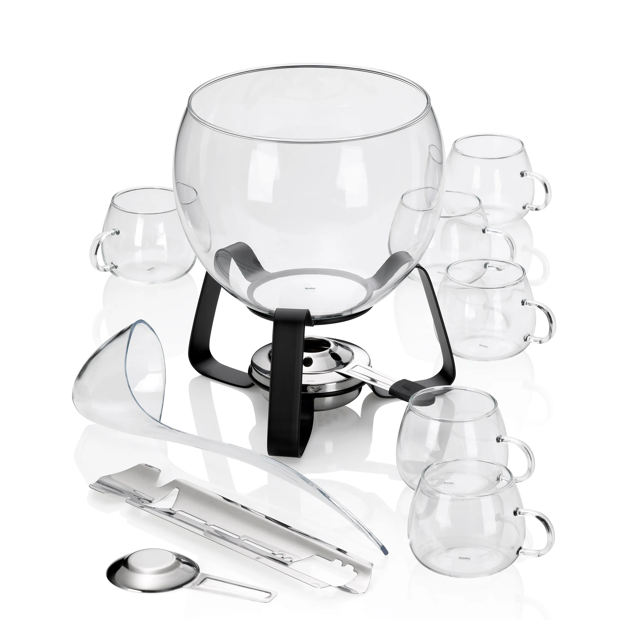 Glühwein Set mit Serviertopf und Zubehör Glühwein-Servierset mit großem Glastopf auf schwarzem Metallständer, sechs Bechern, Kelle und Zange