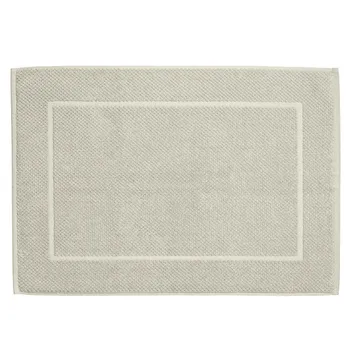 Beige Badezimmermatte mit strukturiertem Gewebe und rechteckigem, erhabenenem Muster in der Mitte