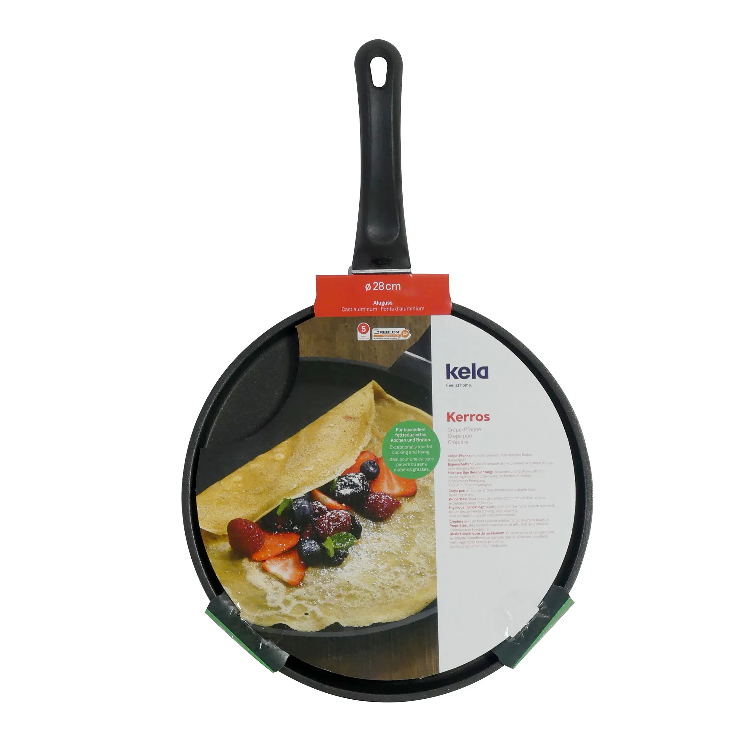 Schwarze Aluminium-Crepes-Pfanne Kerros 28 cm mit schwarzem Griff, gefüllt mit Crepes und Früchten auf der Verpackung