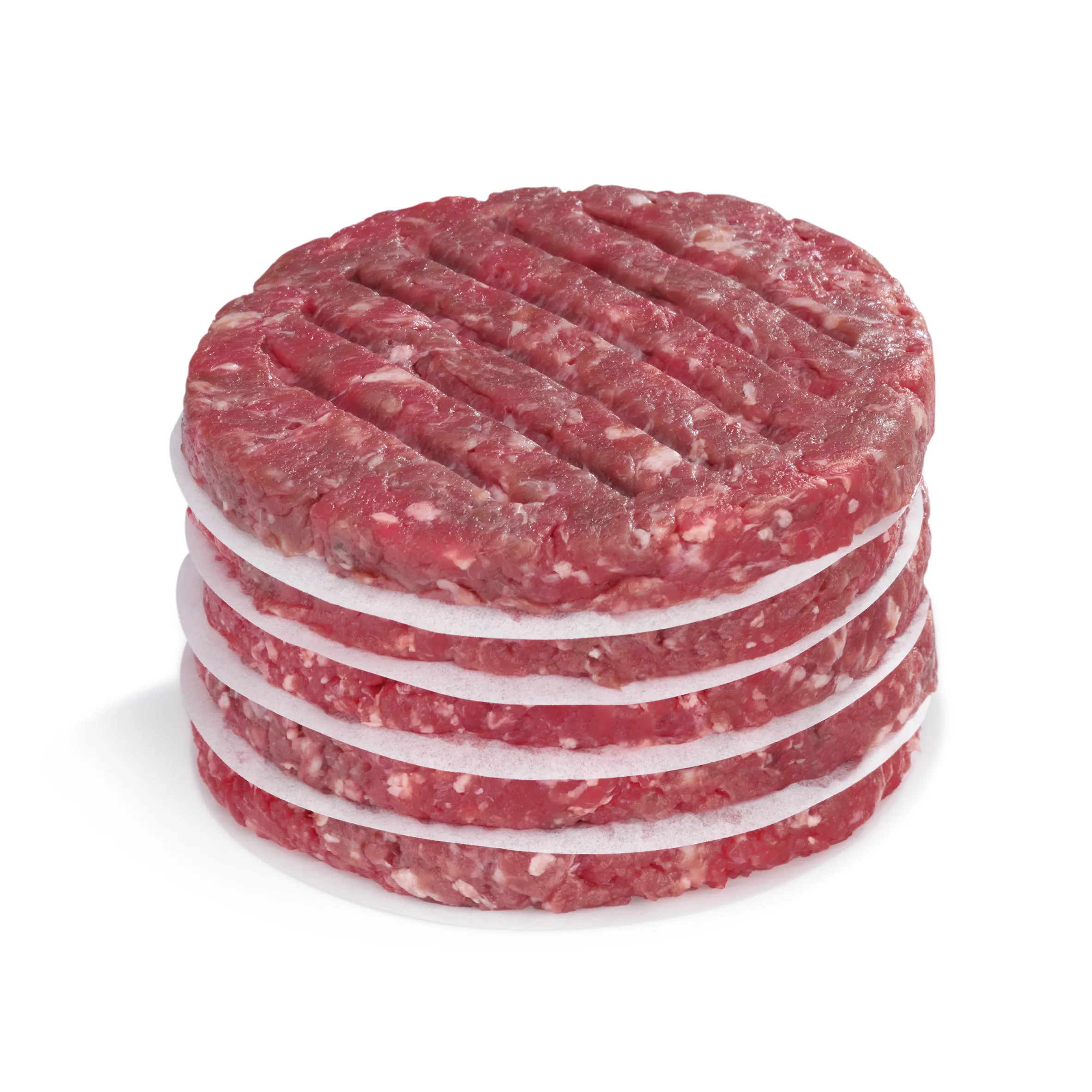 Frische Hackfleisch-Patties Burger Fleisch Gestapelte rohe Hackfleisch-Patties mit Pergamentpapier-Zwischenschichten auf weißem Hintergrund