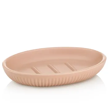 Ovale Seifenschale in zartem Rosa mit gerilltem Muster und integrierten Abflussnuten