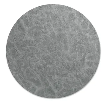 Plaque de pierre ronde grise avec texture naturelle et motif de fines fissures sur fond blanc