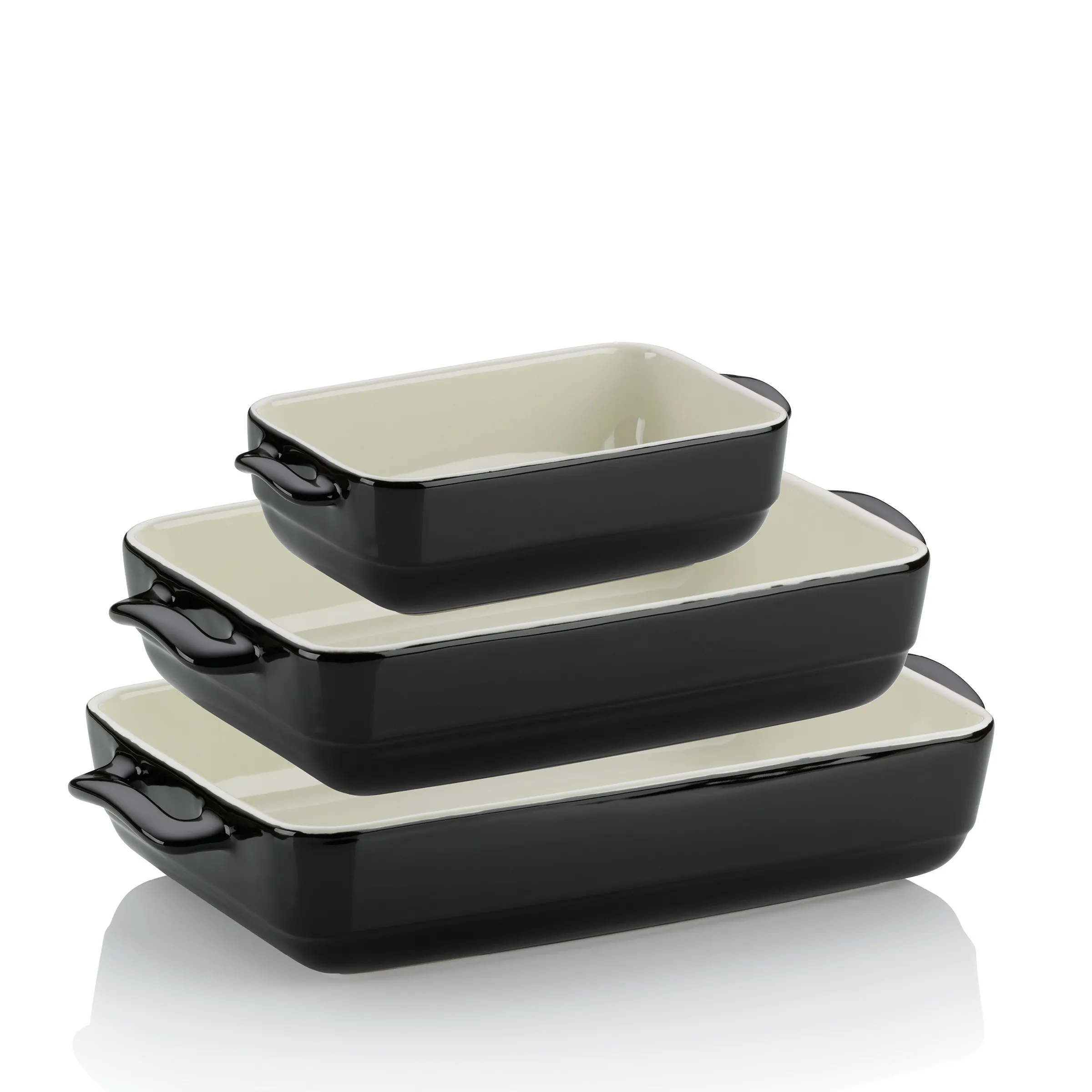 Schwarze Auflaufformen Set 3-teilig - Keramik Backformen mit Griffen Set aus drei schwarzen Auflaufformen in verschiedenen Größen mit cremefarbener Innenbeschichtung gestapelt