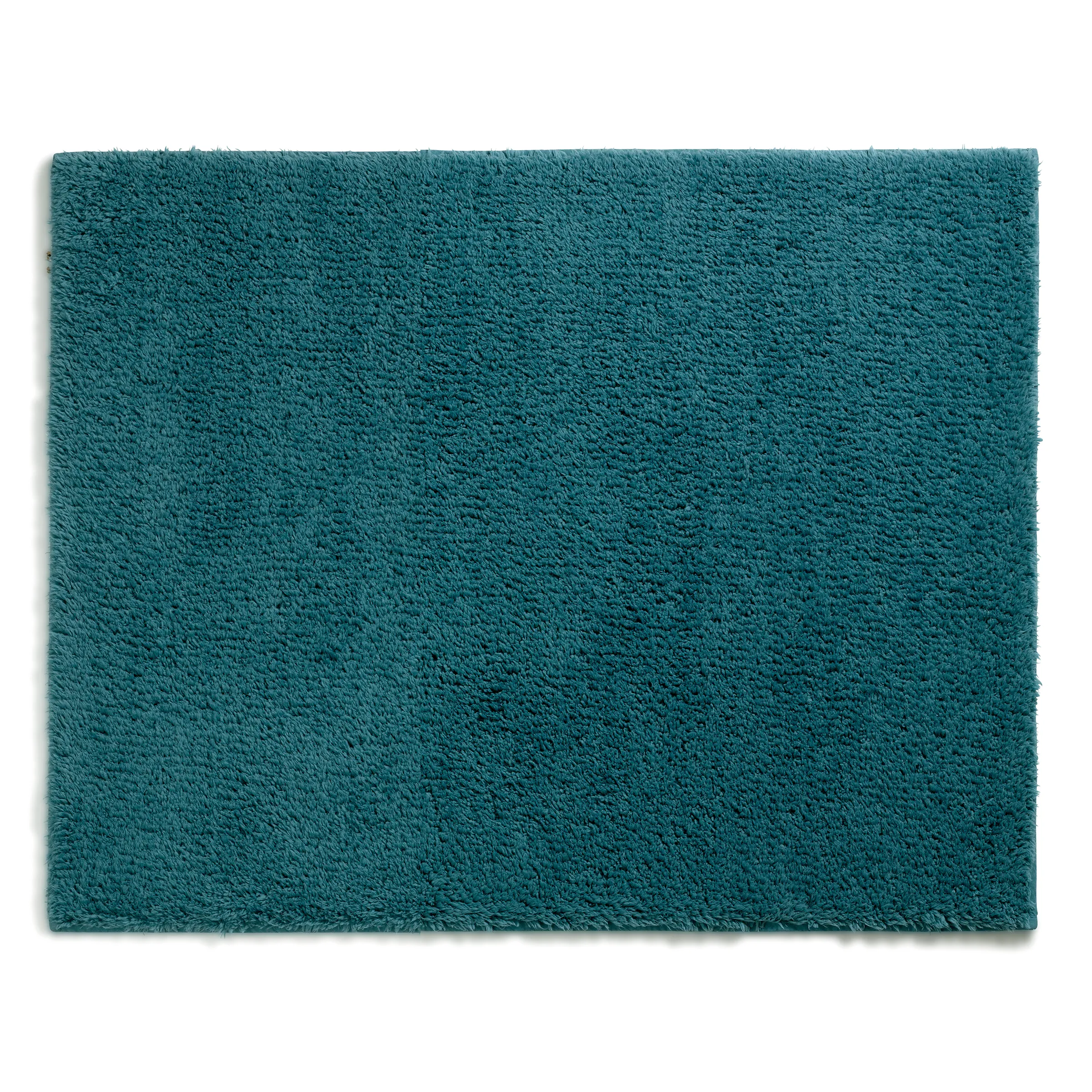 Flauschiger Teppich in Petrol-Blaugrün mit weicher Oberfläche und strukturiertem Flor.