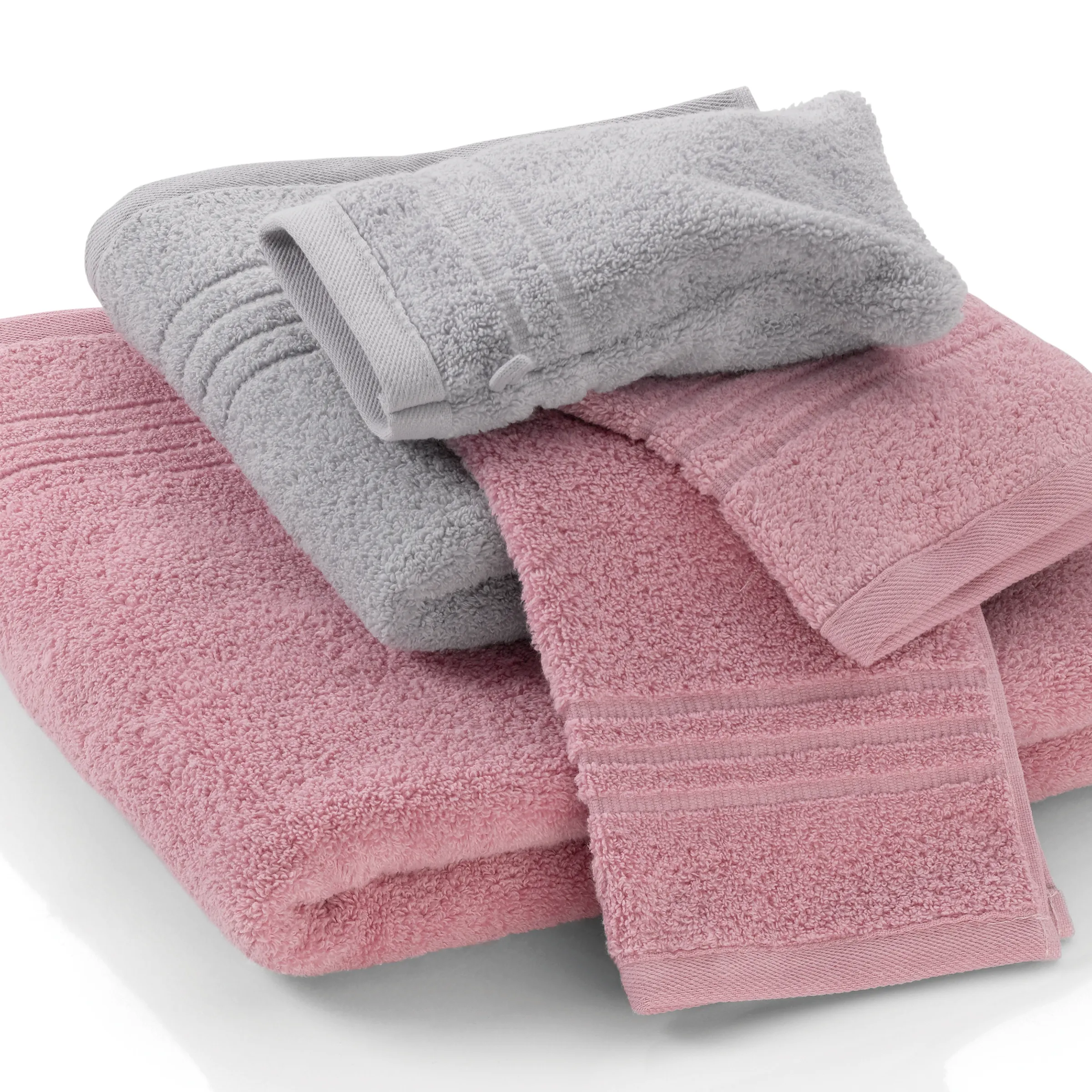 Handtücher Set Frottee grau rosa Stapel aus grauem und rosafarbenem Frottee-Handtuch mit gebogenen Kanten und Webkanten