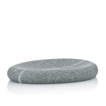 Ovale graue Granitseifenschale mit natürlicher Steinstruktur und konkaver Oberfläche auf weißem Hintergrund