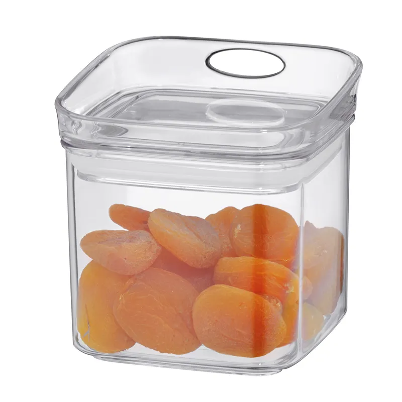 Aprikosen Lagerbehälter - Frischhaltedose Kunststoff Transparenter Kunststoffbehälter mit verschlossenem Deckel, gefüllt mit getrockneten Aprikosen in orange-rötlichen Farbtönen.