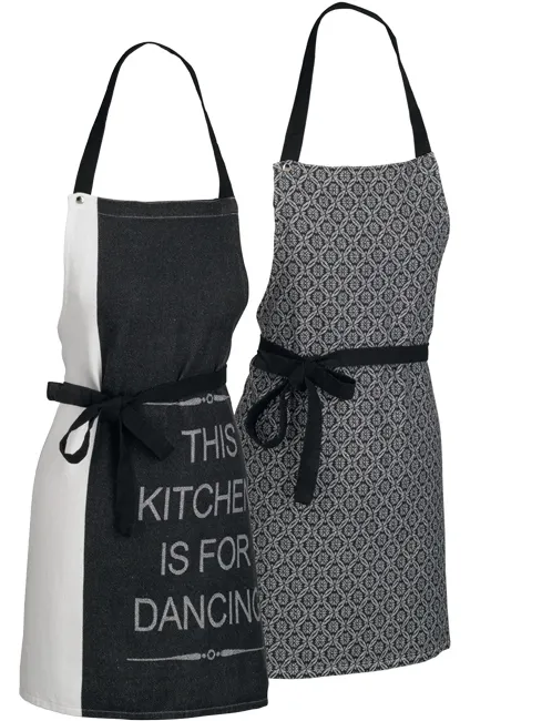 Guide to Painting Landscapes Zwei schwarze Kochschürzen mit Mustern und Aufschrift, eine mit Text „This Kitchen is for Dancing