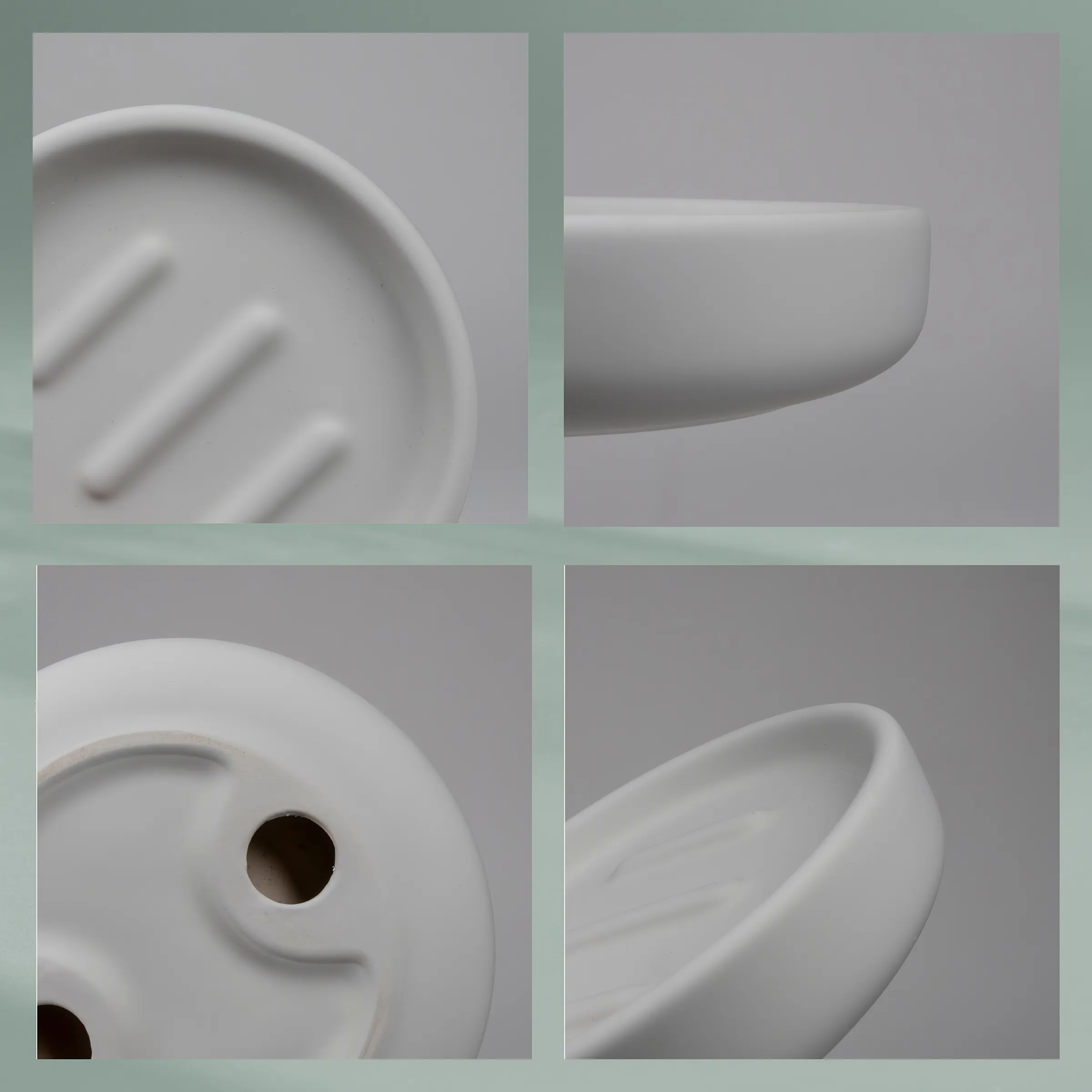 Nahaufnahme weißer Keramikprodukte mit glatten Oberflächen und organischen Formen auf grauem Hintergrund
