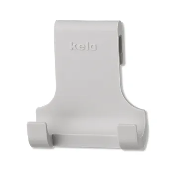 Weißer Kela Smartphone-Halter aus Kunststoff mit Wandmontage und Stiftablage an der Unterseite