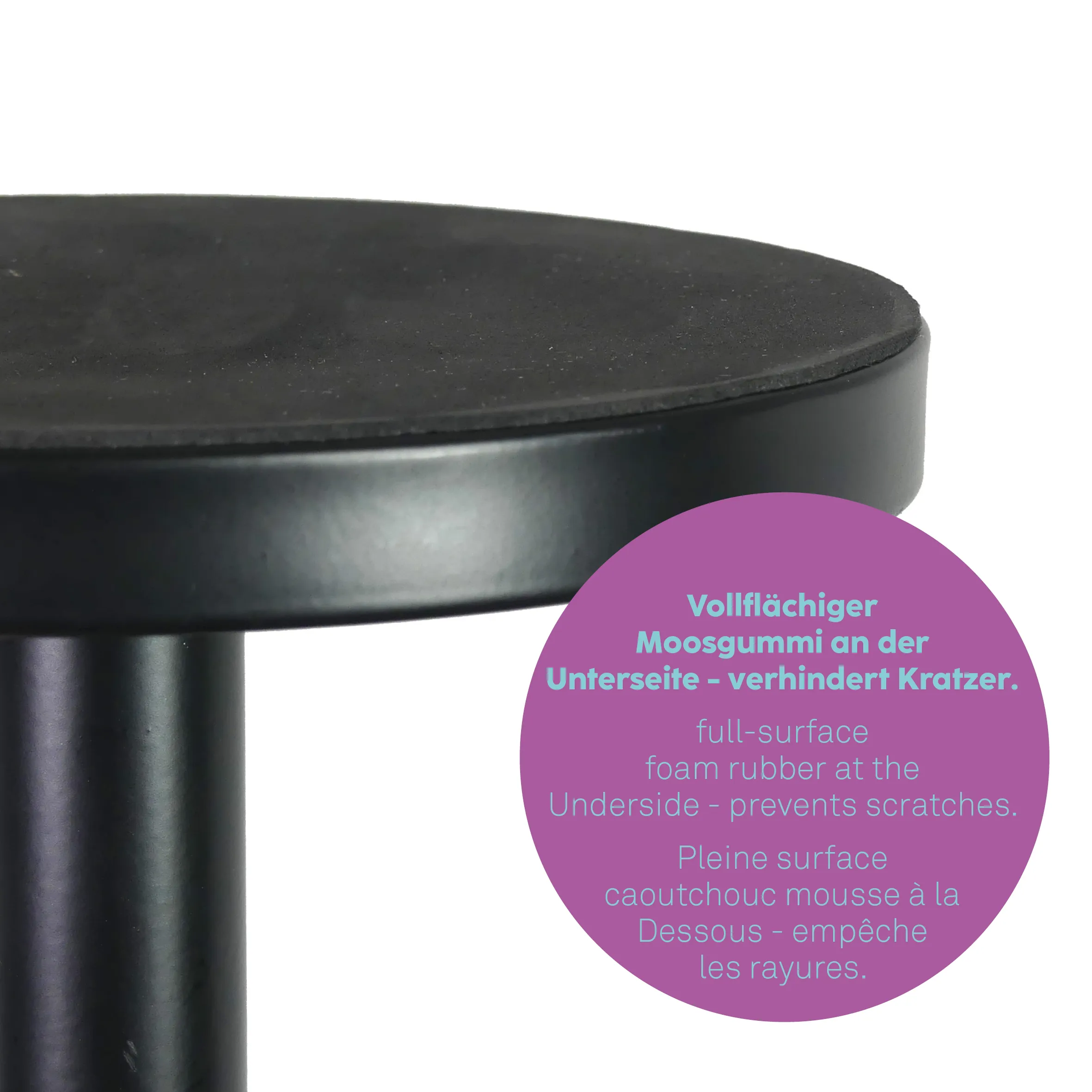 Runder Tisch mit Kratzer-Schutz Moosgummi Schwarzer runder Tisch mit metallischem Fuß und Moosgummi an der Unterseite zur Kratzerprävention.
