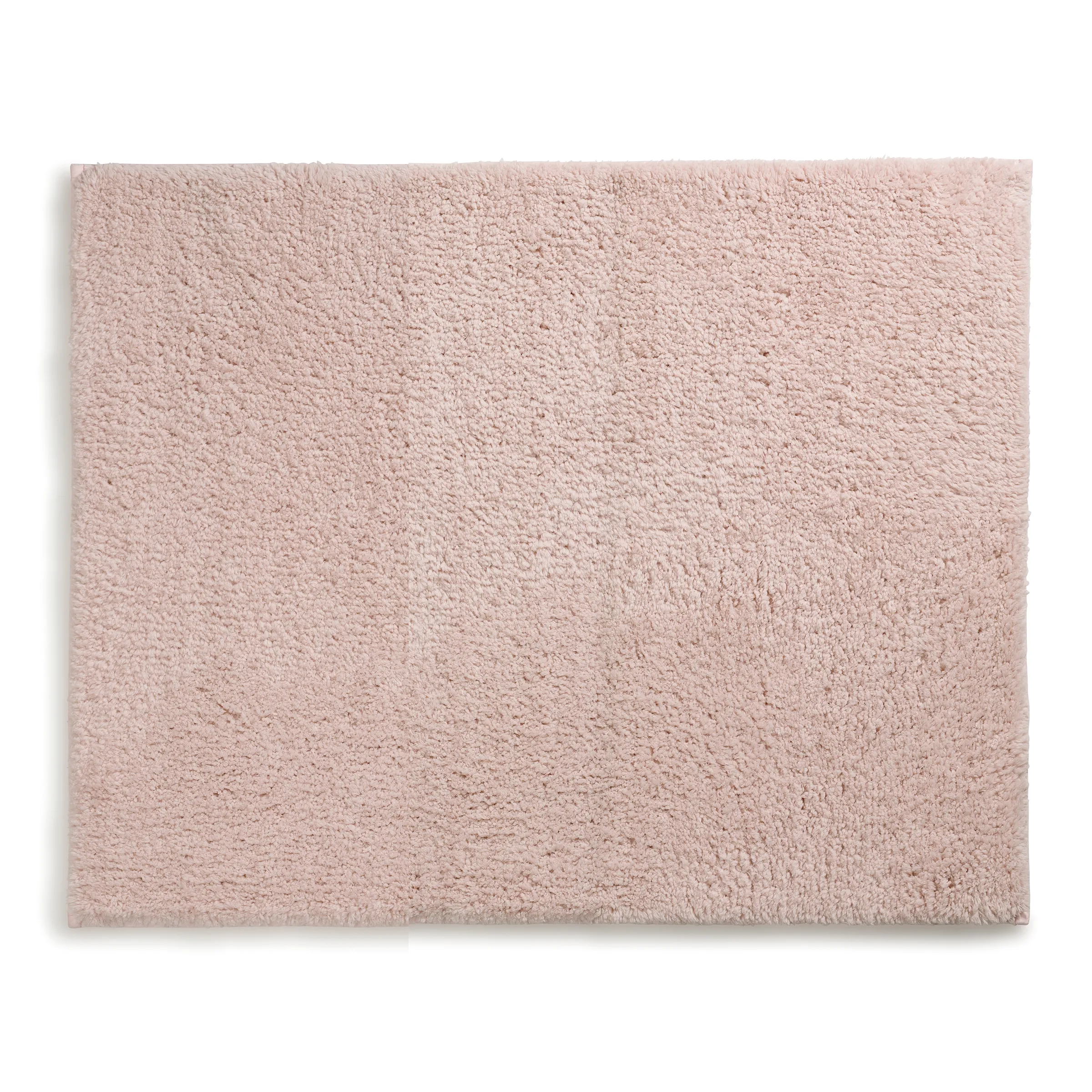 Rosa Badematte mit weicher Hochflor-Textur auf weißem Hintergrund