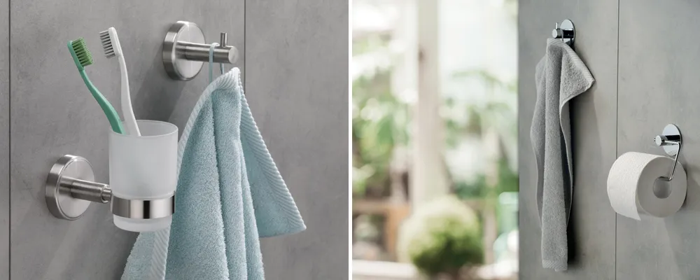 Badezimmer Accessoires Set Edelstahl Wandmontage Modernes Badezimmer-Accessoireset aus Edelstahl mit Zahnbürstenhalter, Handtuchhalter und Toilettenpapierhalter an grauer Wand