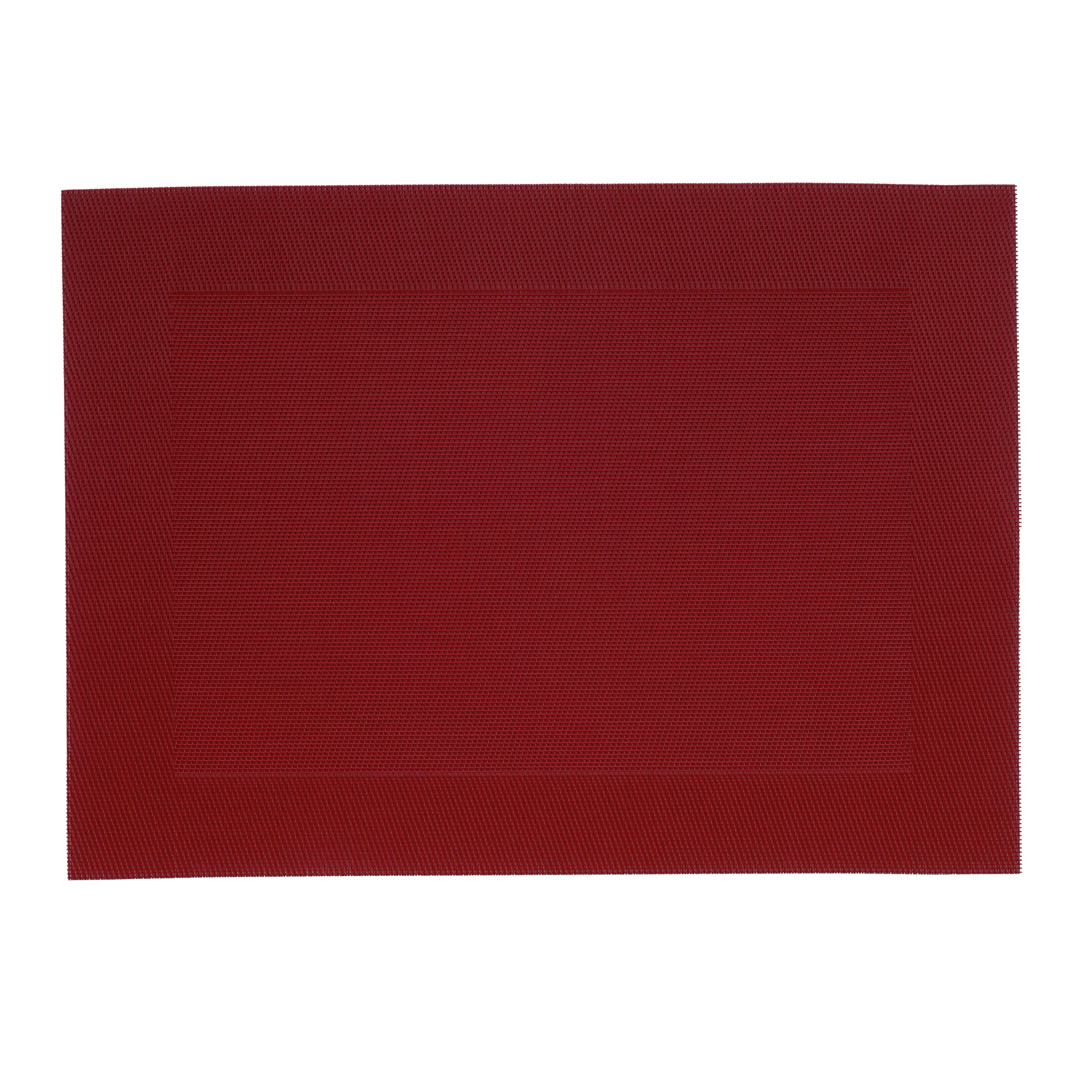 Red placemat - modern table setting Red plastic placemat with textured surface and rectangular shape for dining table use.