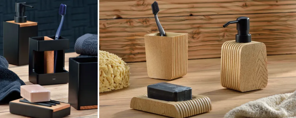 Zwei Sets von moderner Badezimmer-Accessoires in Schwarz und Holz mit Zahnbürsten, Seifenspendern und Behältern