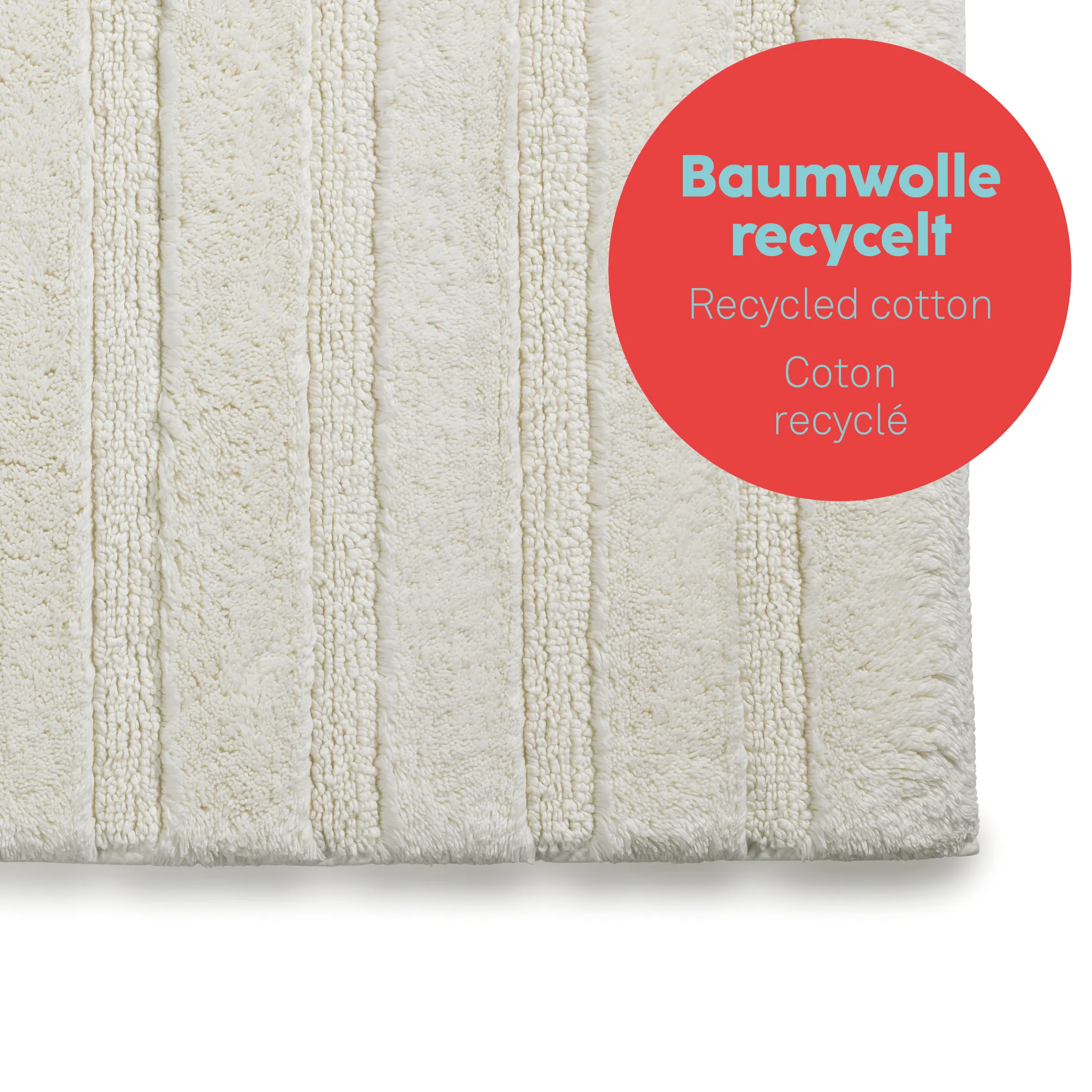 Badvorleger recycelte Baumwolle - nachhaltiger Badteppich creme Cremefarbener Badvorleger aus recycelter Baumwolle mit strukturierten Streifen und rotem Nachhaltigkeits-Label