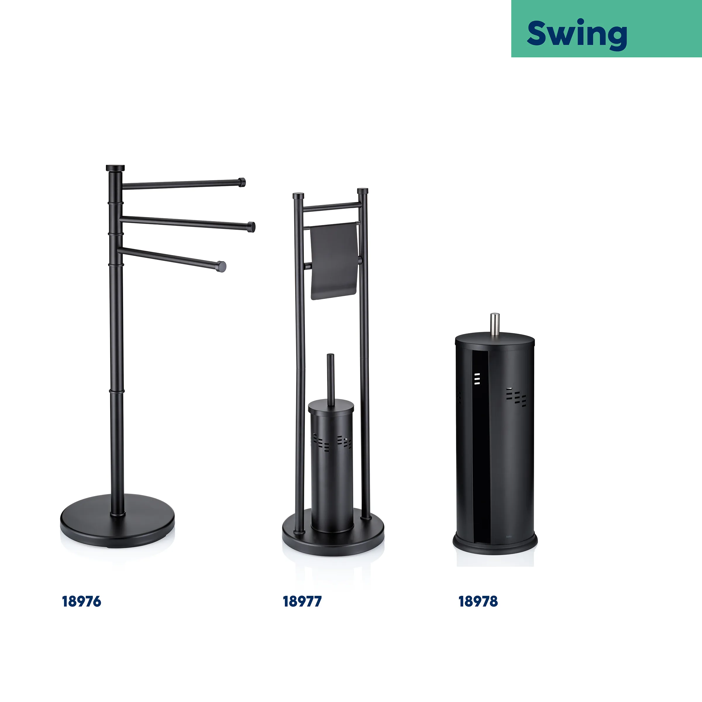 Drei schwarze Badaccessoires der Swing-Serie: Handtuchhalter, WC-Garnitur und Toilettenbürstenhalter
