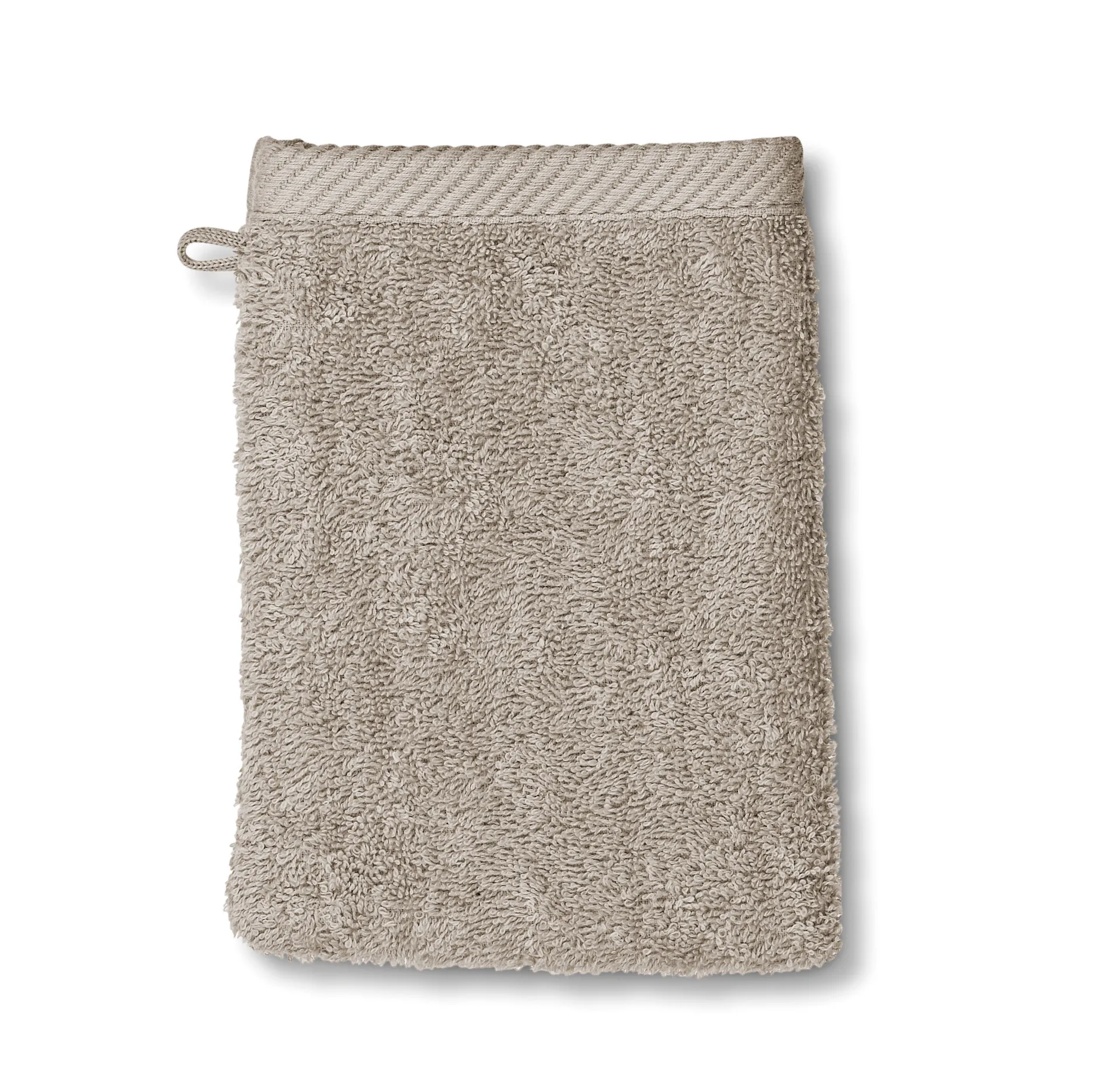 Waschhandschuh Frottee beige Beige Waschhandschuh aus Frottee mit strukturierter Oberfläche und Aufhängeschlaufe, frontal fotografiert.