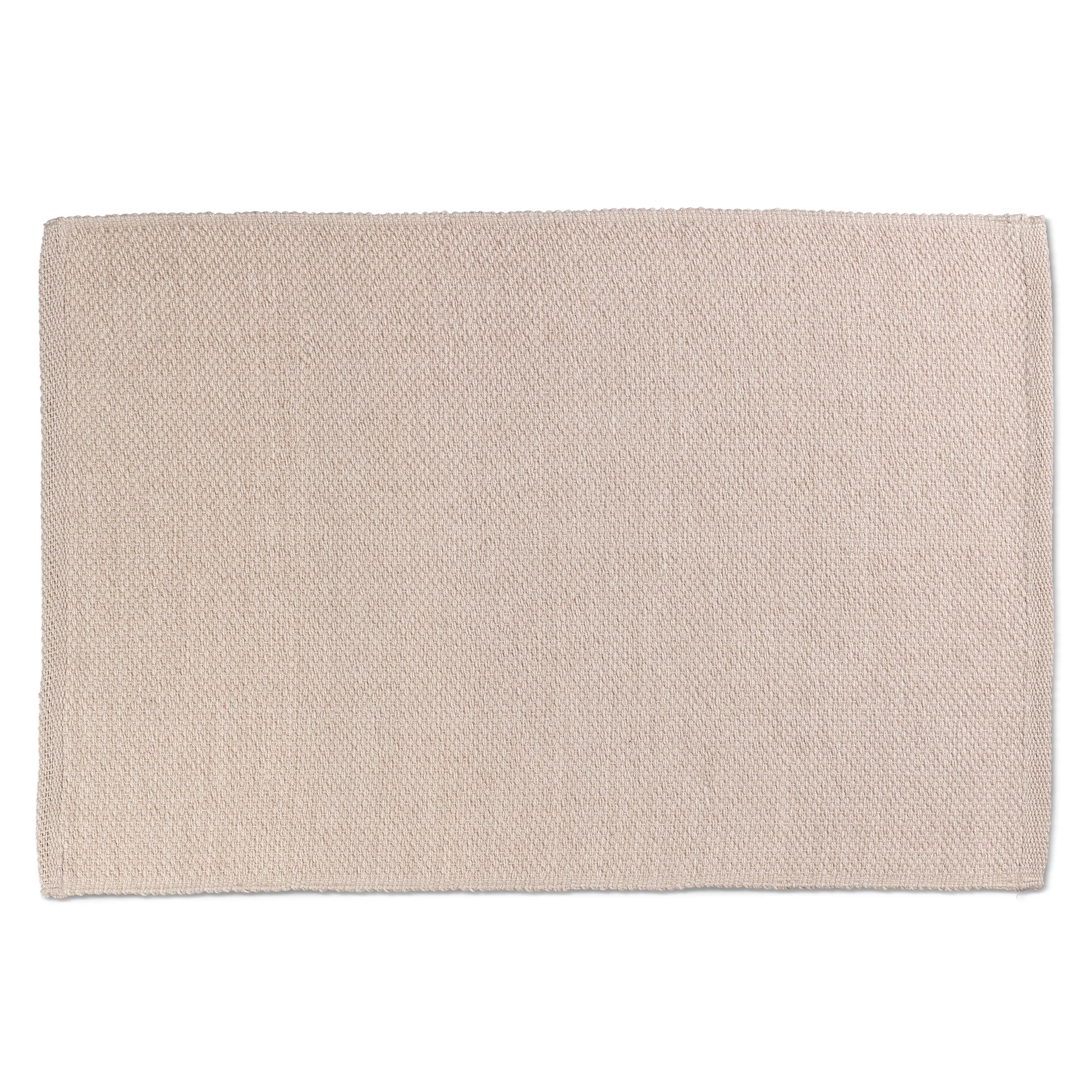 Beige Baumwoll-Küchenhandtuch mit Struktur Beige Baumwolltuch mit strukturierter Oberfläche und gezackten Kanten auf hellem Hintergrund