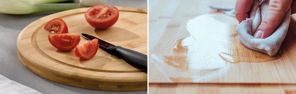 Rundes Bambus-Schneidebrett mit Tomaten und Reinigung – Pflegeleichte Küchenbretter Geschnittene Tomaten auf rundem Bambus-Schneidebrett mit Messer, daneben Hand reinigt Brett mit Tuch
