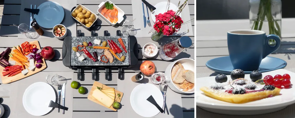 Raclette Party Set - Tischgrill mit Zubehör und Dessert Raclette-Tisch mit Grillgerät, Käse, Gemüse, Fleisch und Getränken sowie Dessertplatte mit Beeren und Kaffee