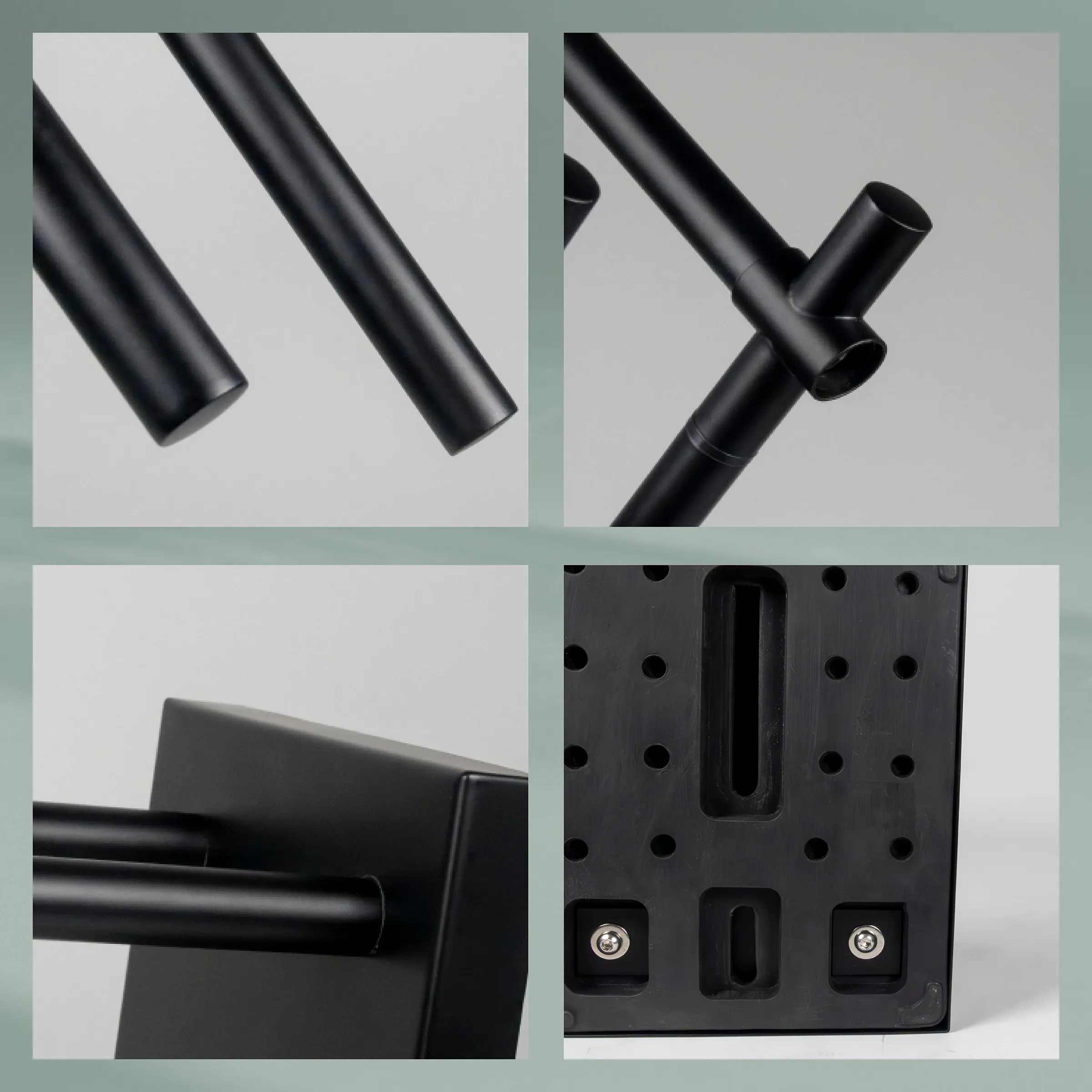 Schwarze Metallrohre und Verbindungselemente sowie Montageplatte eines modularen Regalsystems in Detailansicht